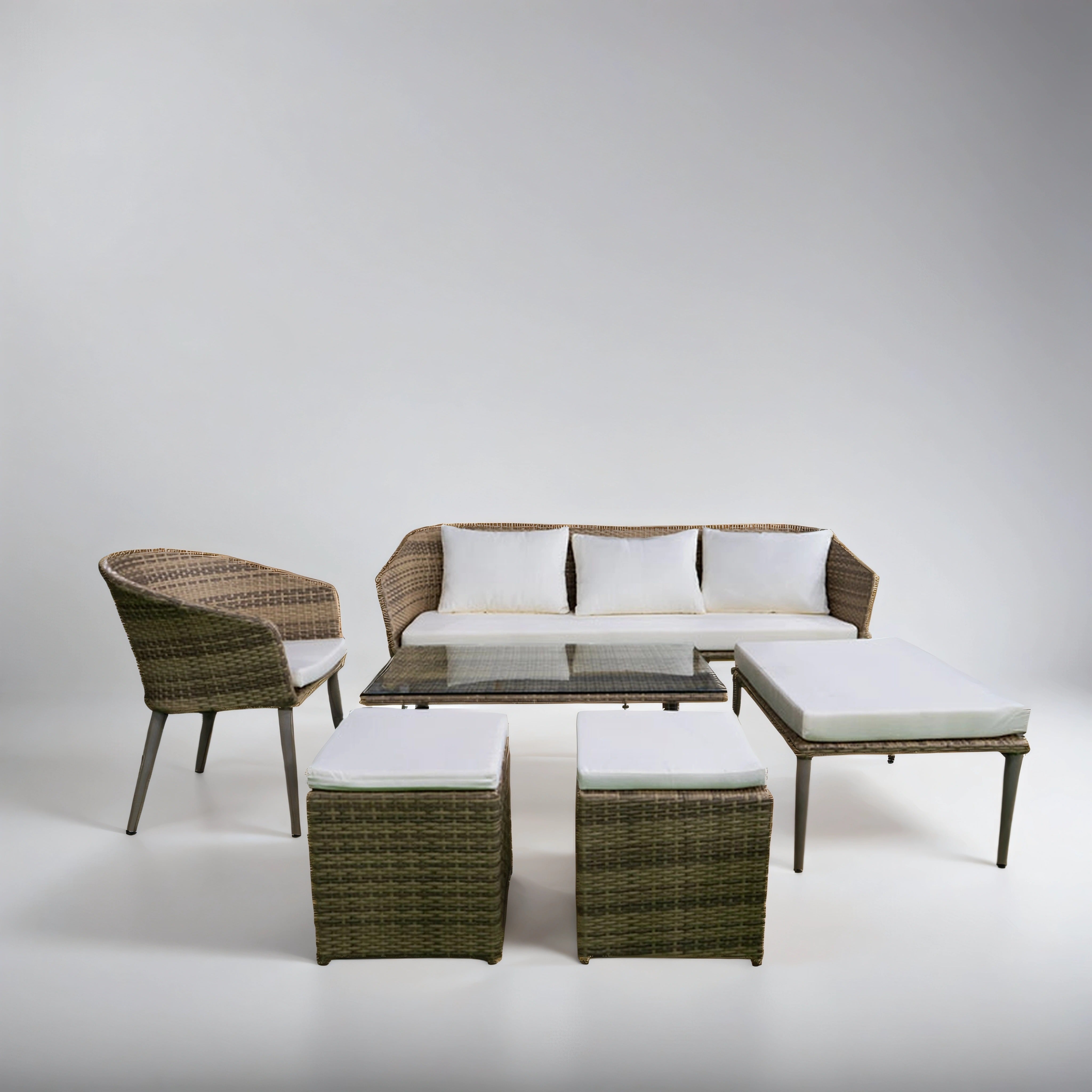 White lounge set with table and ottomans